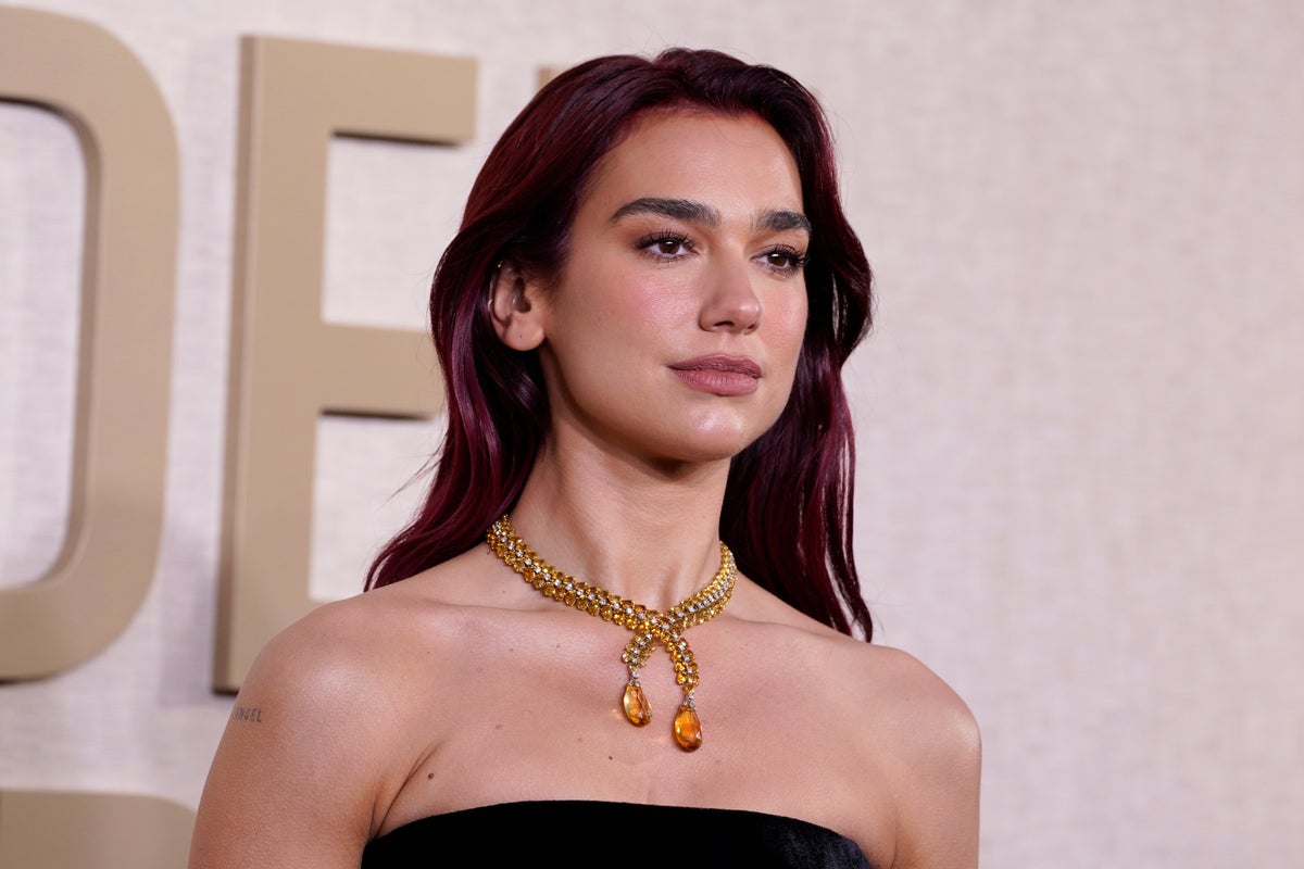 Dua Lipa hits back at jokes about her always being on holiday: ‘It’s work hard, play hard’