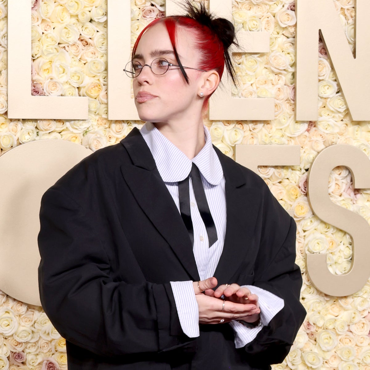 billie eilish dress shirt Billie Eilish (@billieeilish) returned to the Grammy (@grammys) Awards in signature offbeat style, wearing a custom HODAKOVA (@hoda_kova) ensemble crafted from deadstock navy wool trousers. The deconstructed jacket-and-skirt lookfinished with layered