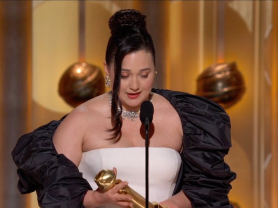 Lily Gladstone accepting her Golden Globe