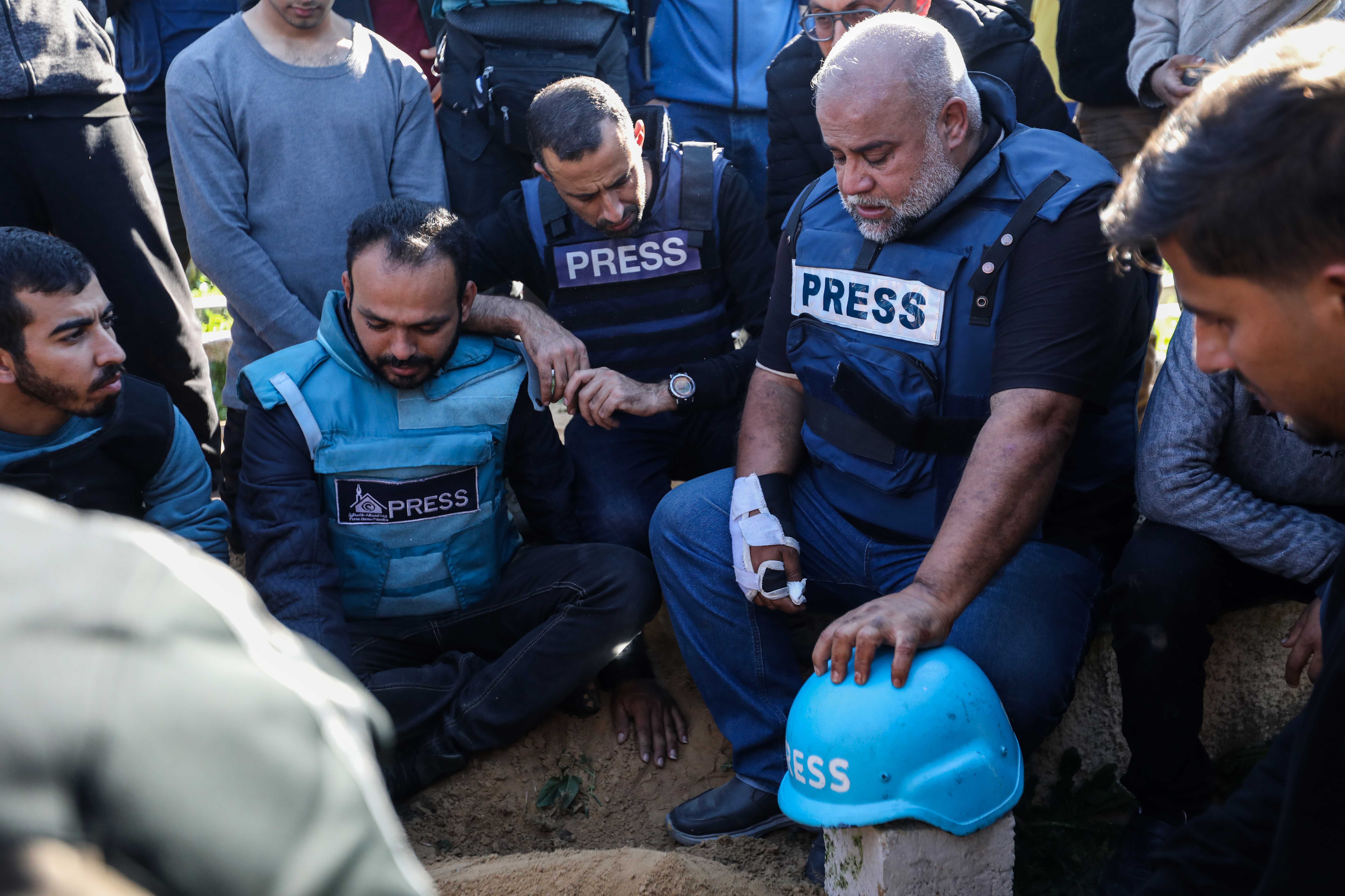 Family and friends including Al Jazeera reporter, Wael Al-Dahdouh bid farewell to the bodies of journalists Hamza Al-Dahdouh and Mustafa Thuraya killed in Gaza in January