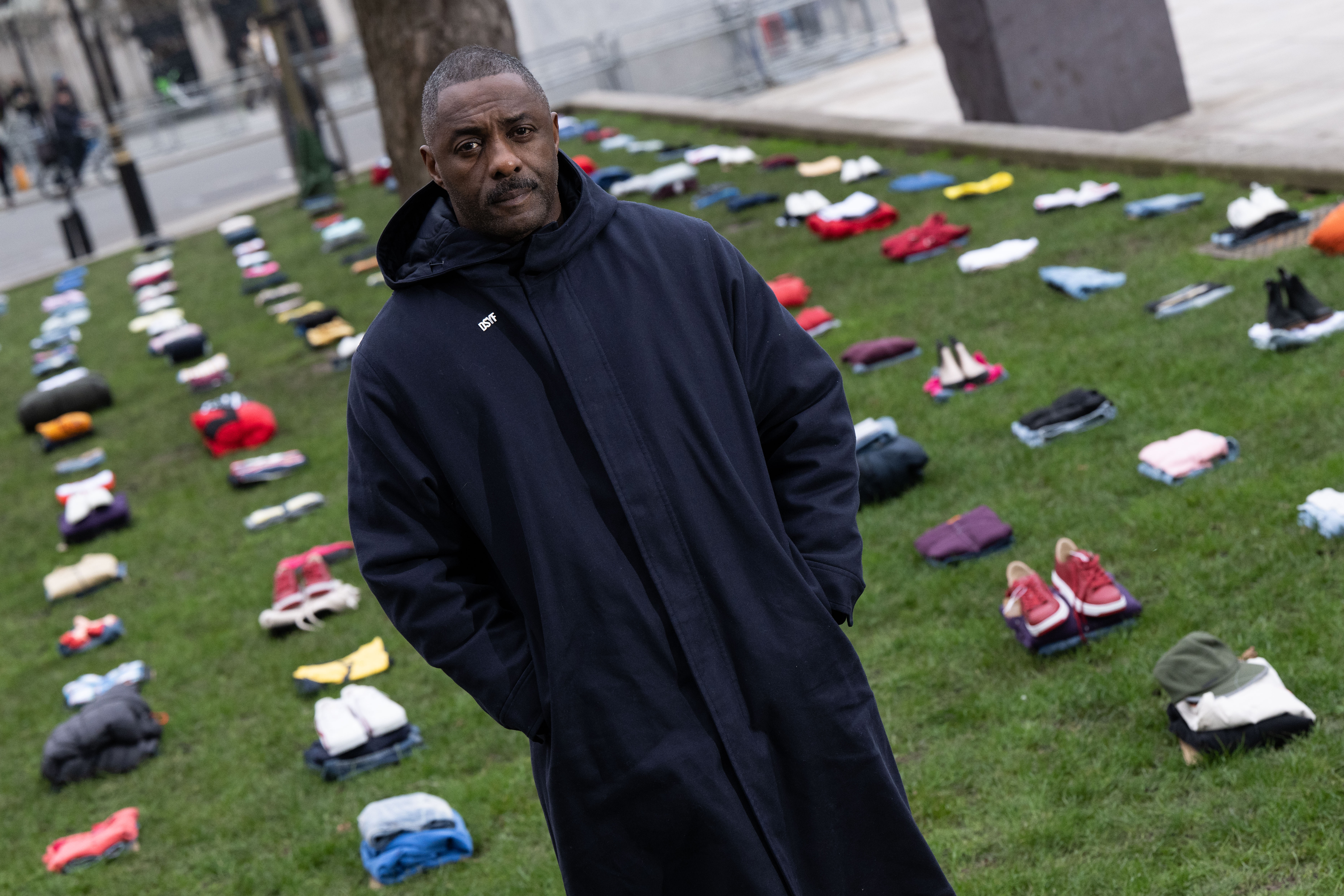 Idris Elba stood in front of an installation of over 200 bundles of clothing representing the lives lost to knife crime in the UK earlier this month