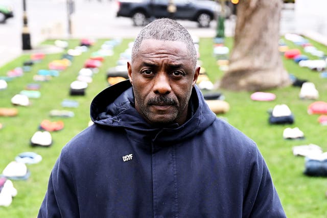 <p>The clothes laid out in Parliament Square represent the lives lost to knife crime </p>