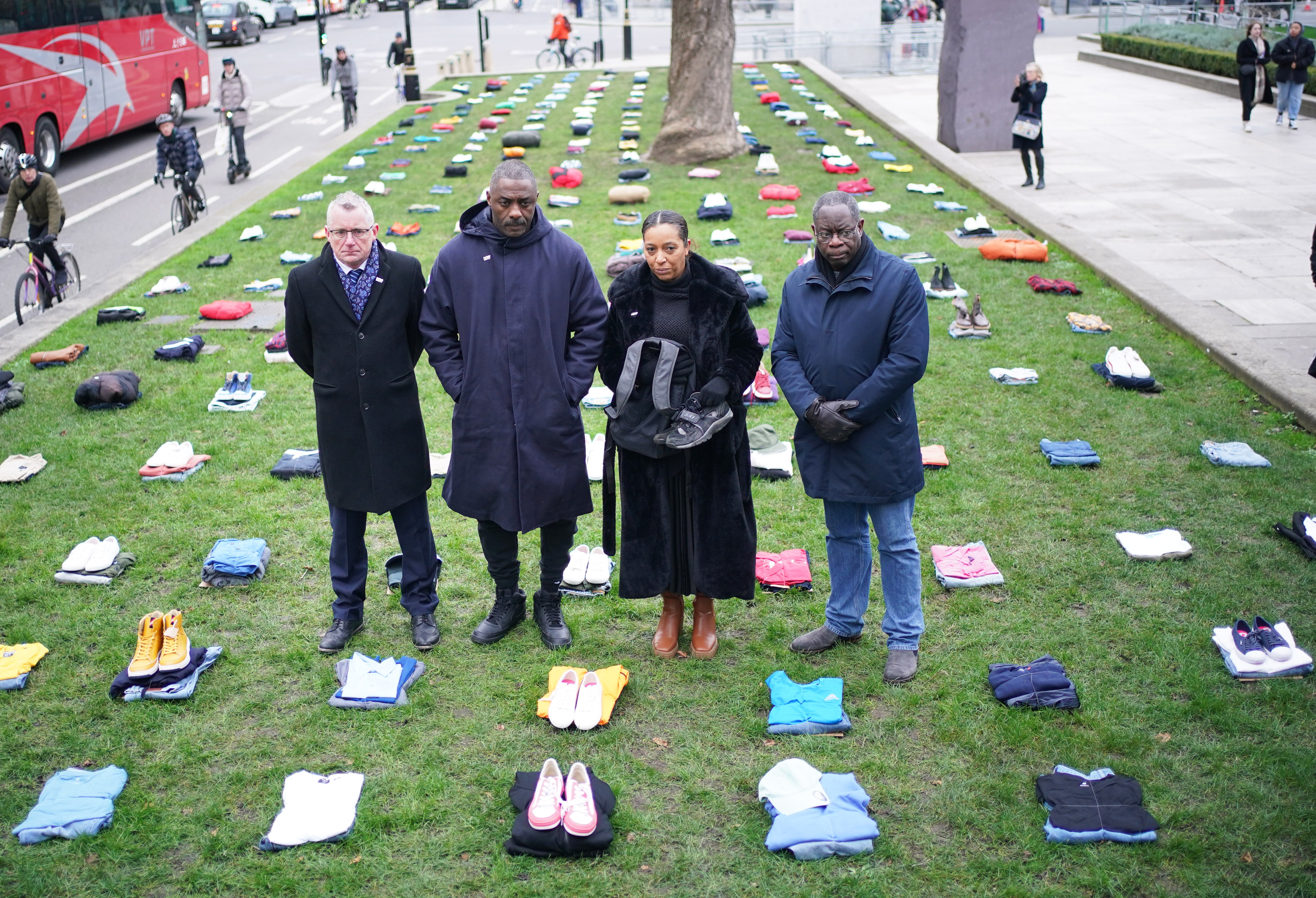Patrick Green (left), Yemi Hughes, and Bishop Nicholson (right) join Idris Elba during the launch of his Don’t Stop Your Future campaign in Parliament Square, Westminster