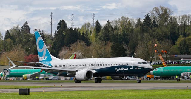 <p>A Boeing 737 Max 9 taxis on a runway </p>