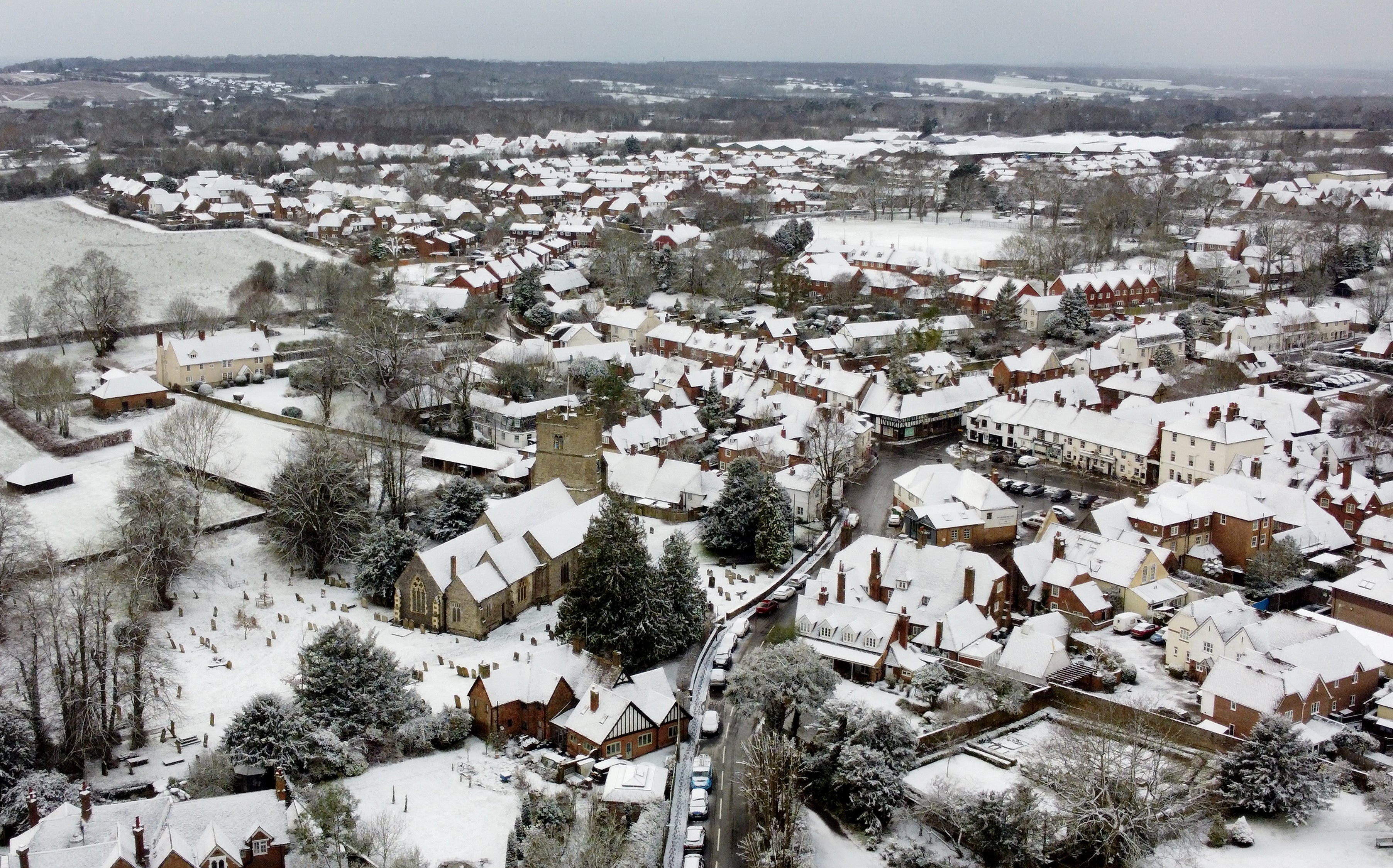 A view over the village of Lenham in Kent following snowfall.