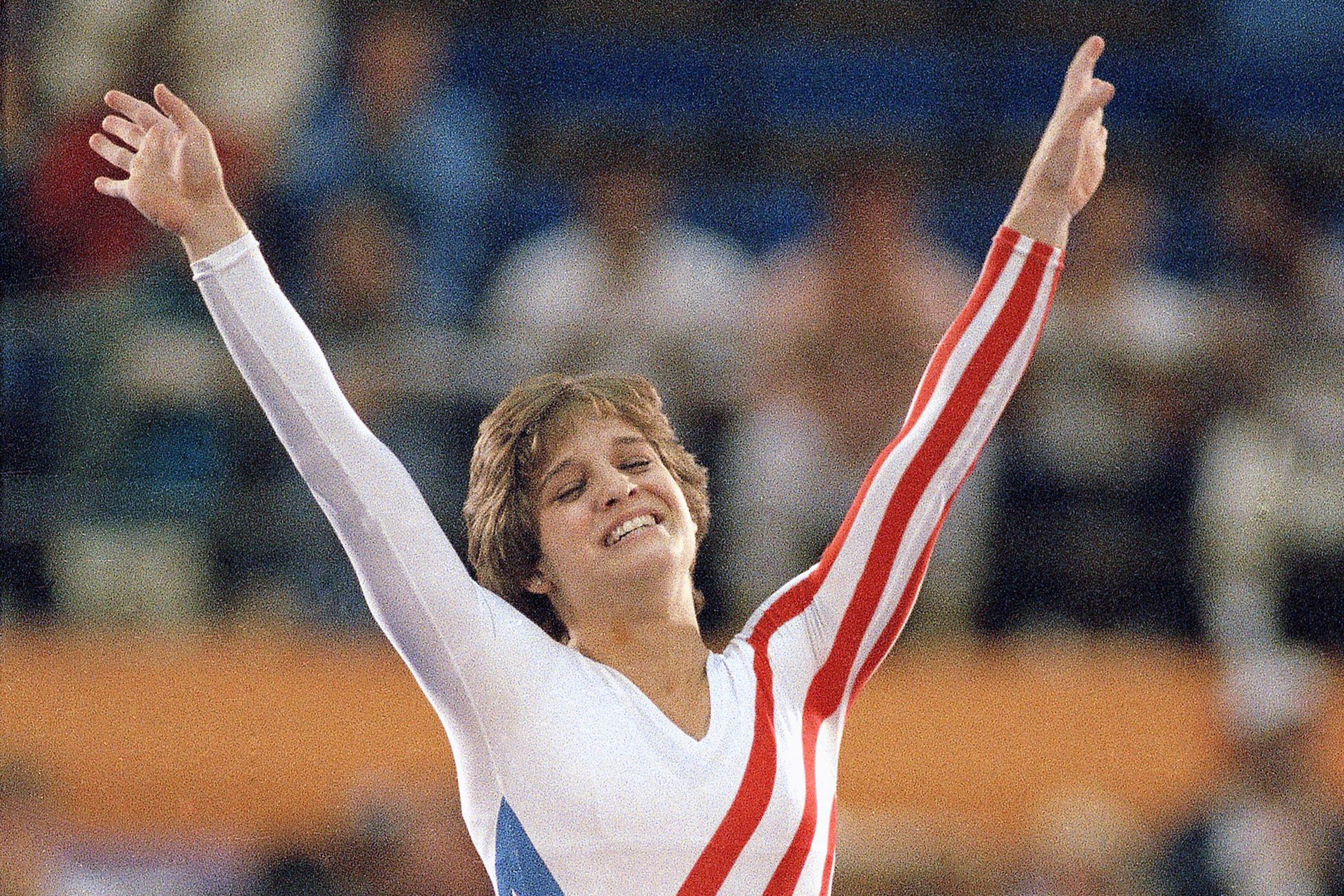 Mary Lou Retton celebrates her balance beam score at the 1984 Olympic Games in LA