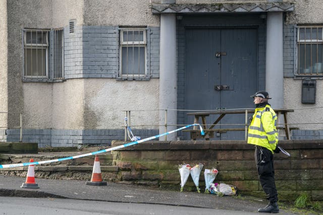 Floral tributes were left outside the pub in Edinburgh where Marc Webley was shot (Jane Barlow/PA)