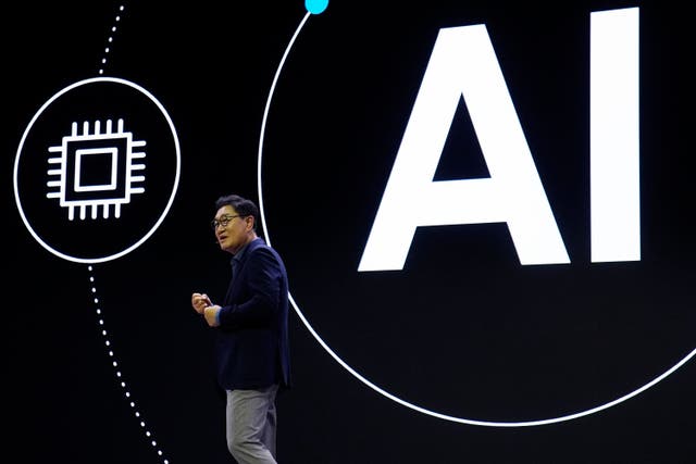 JH Han, CEO and Head of the Device Experience Division at Samsung Electronics, speaks during a Samsung press conference ahead of the CES tech show (John Locher/AP)