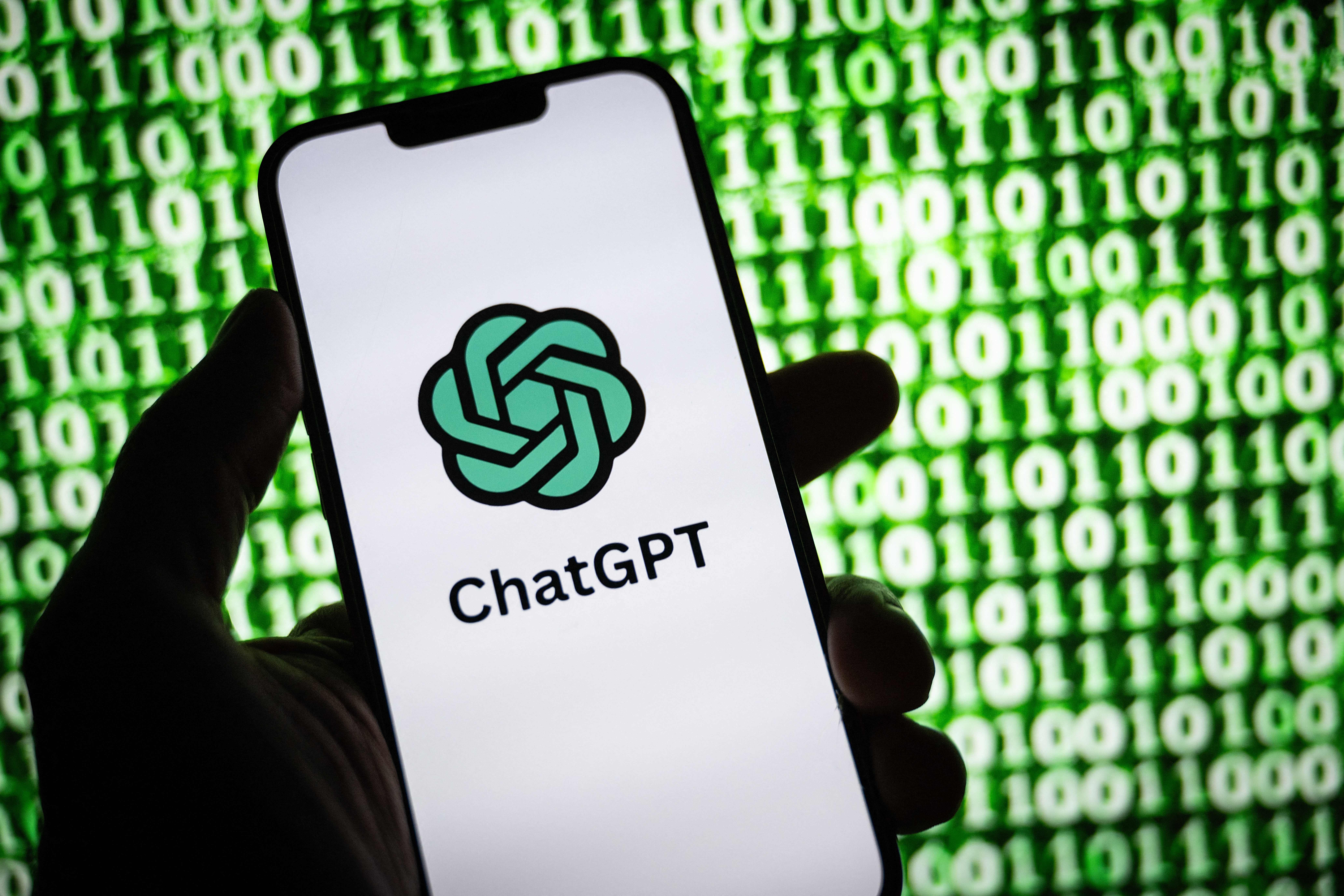 This illustration photograph taken on October 30, 2023, shows the logo of ChatGPT, a language model-based chatbot developed by OpenAI, on a smartphone in Mulhouse, eastern France