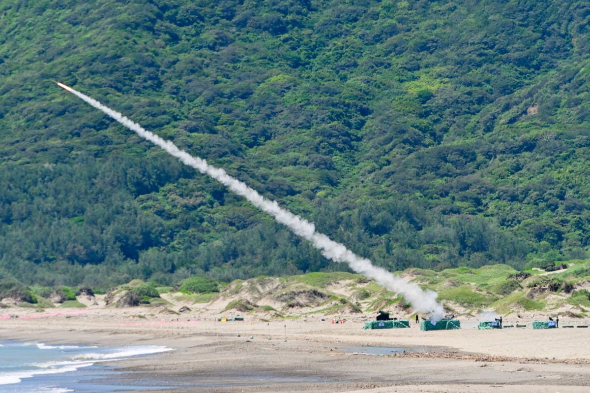 Taiwan&rsquo;s defense ministry issues an air raid alert saying China has launched a satellite