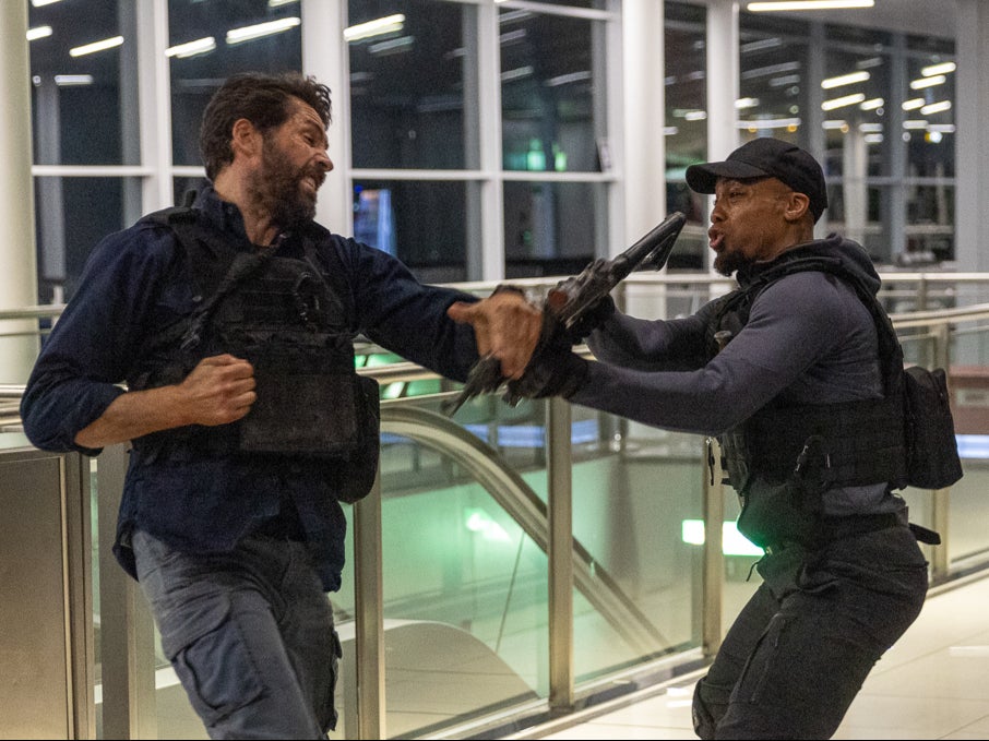 Air rage: Scott Adkins (left), the star of ‘One More Shot’, filming at Stansted airport