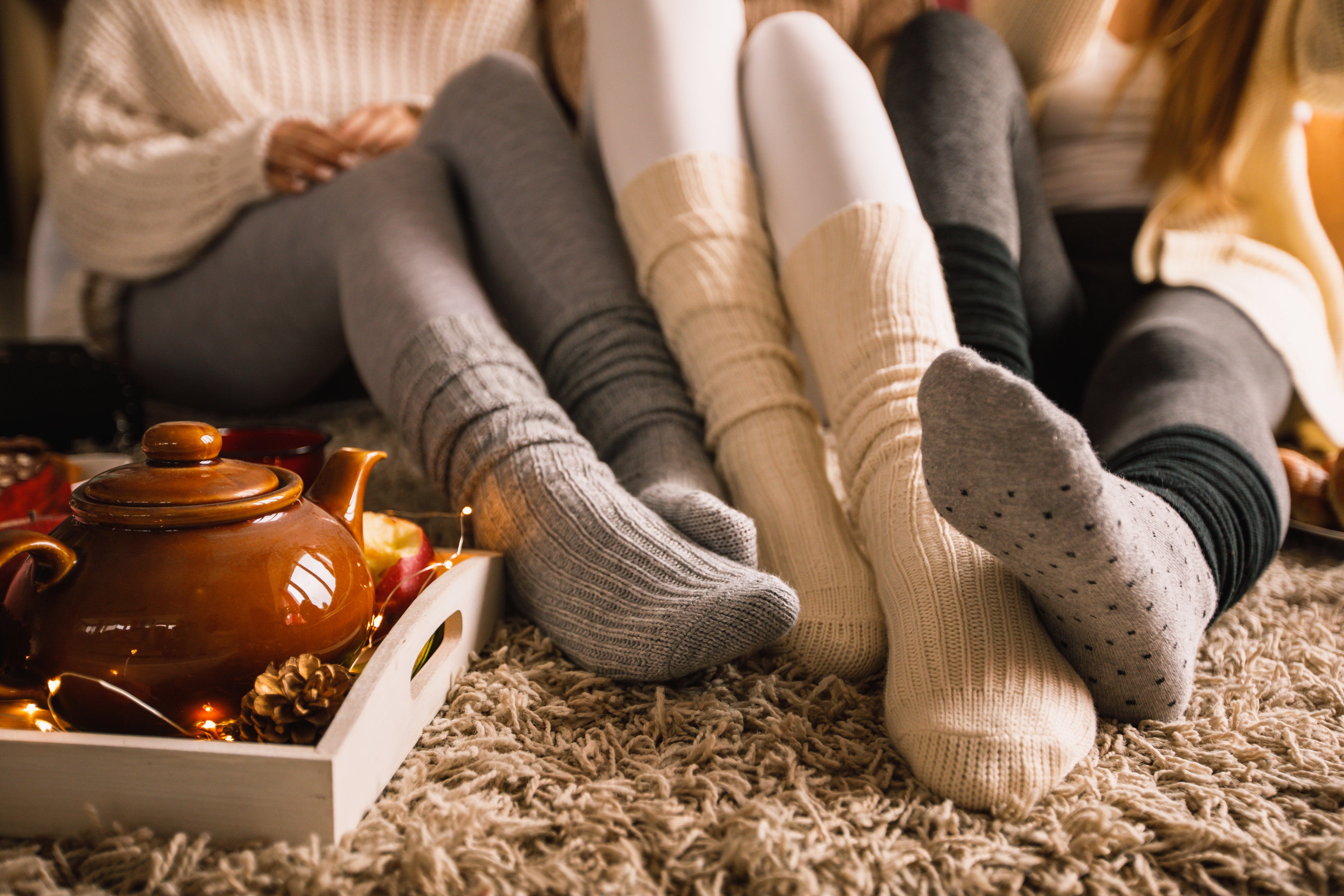 Keep it cosy: warm tea and fluffy socks can help you withstand the winter cold