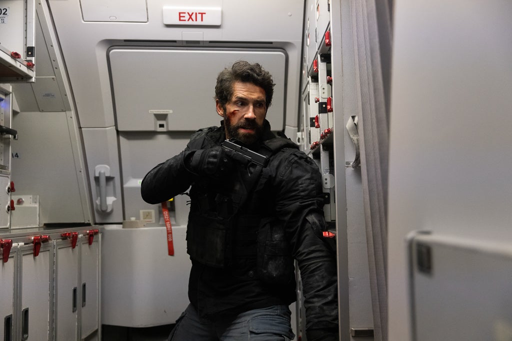 Anything from the galley? Scott Adkins helps out on board
