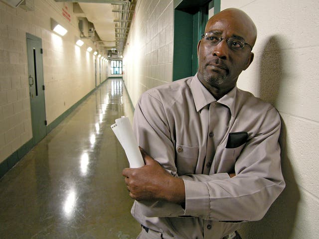 <p>Ronnie Long stands in a hallway at the Albemarle Correctional Institution in Albemarle, North Carolina in 2007</p>