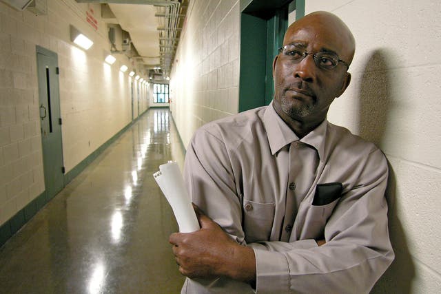<p>Ronnie Long stands in a hallway at the Albemarle Correctional Institution in Albemarle, North Carolina in 2007</p>
