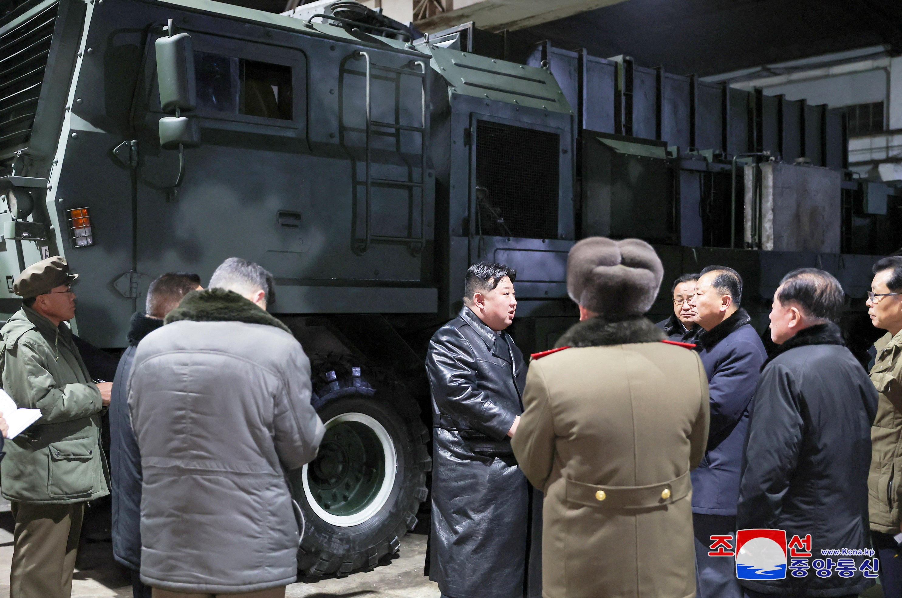 North Korean leader Kim Jong-un visits a munitions factory at an undisclosed location