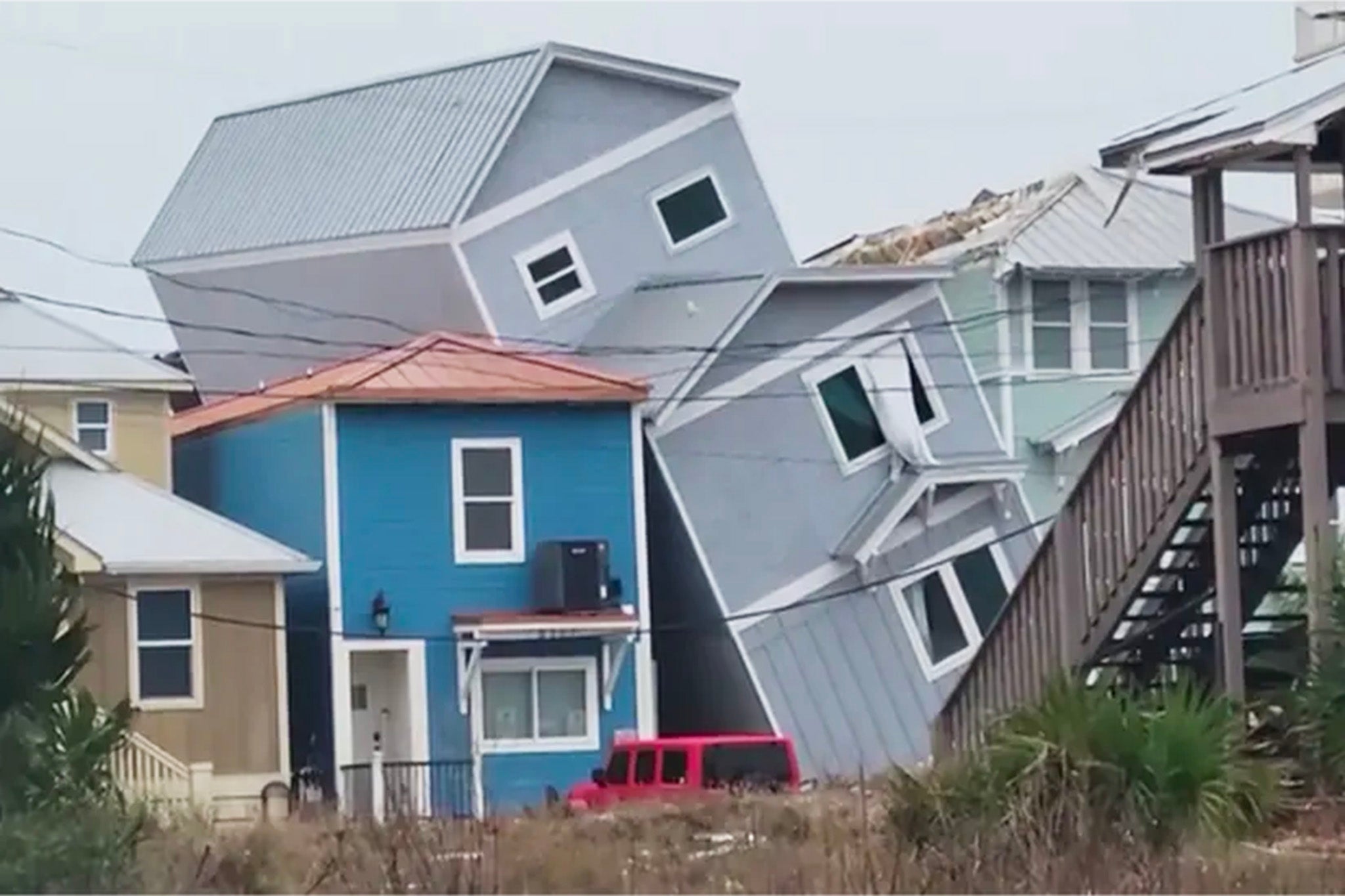 Damage to houses in Panama City Beach, Florida after a storm
