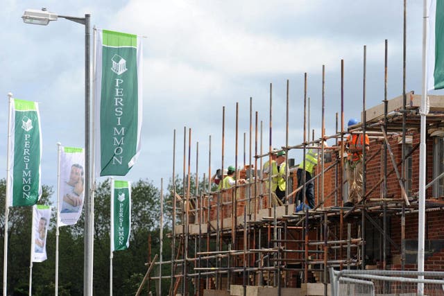 Housebuilder Persimmon said it sold a third fewer homes last year than in 2022 (Owen Humphreys/PA)