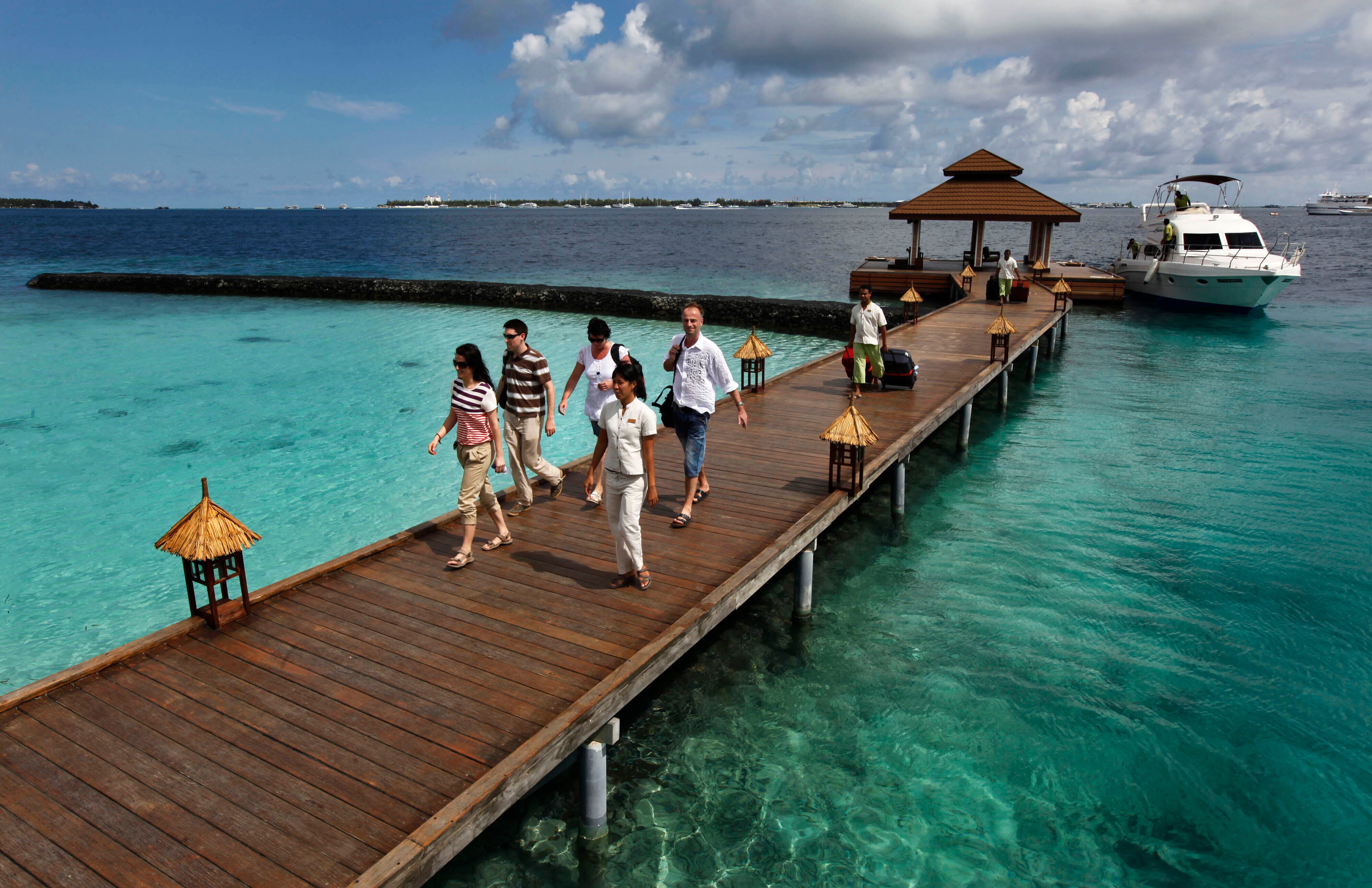 Tourists arrive at Kurumba island in the Maldives