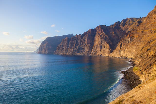 <p>Tenerife’s Los Gigantes cliffs where three people were swept into the water</p>