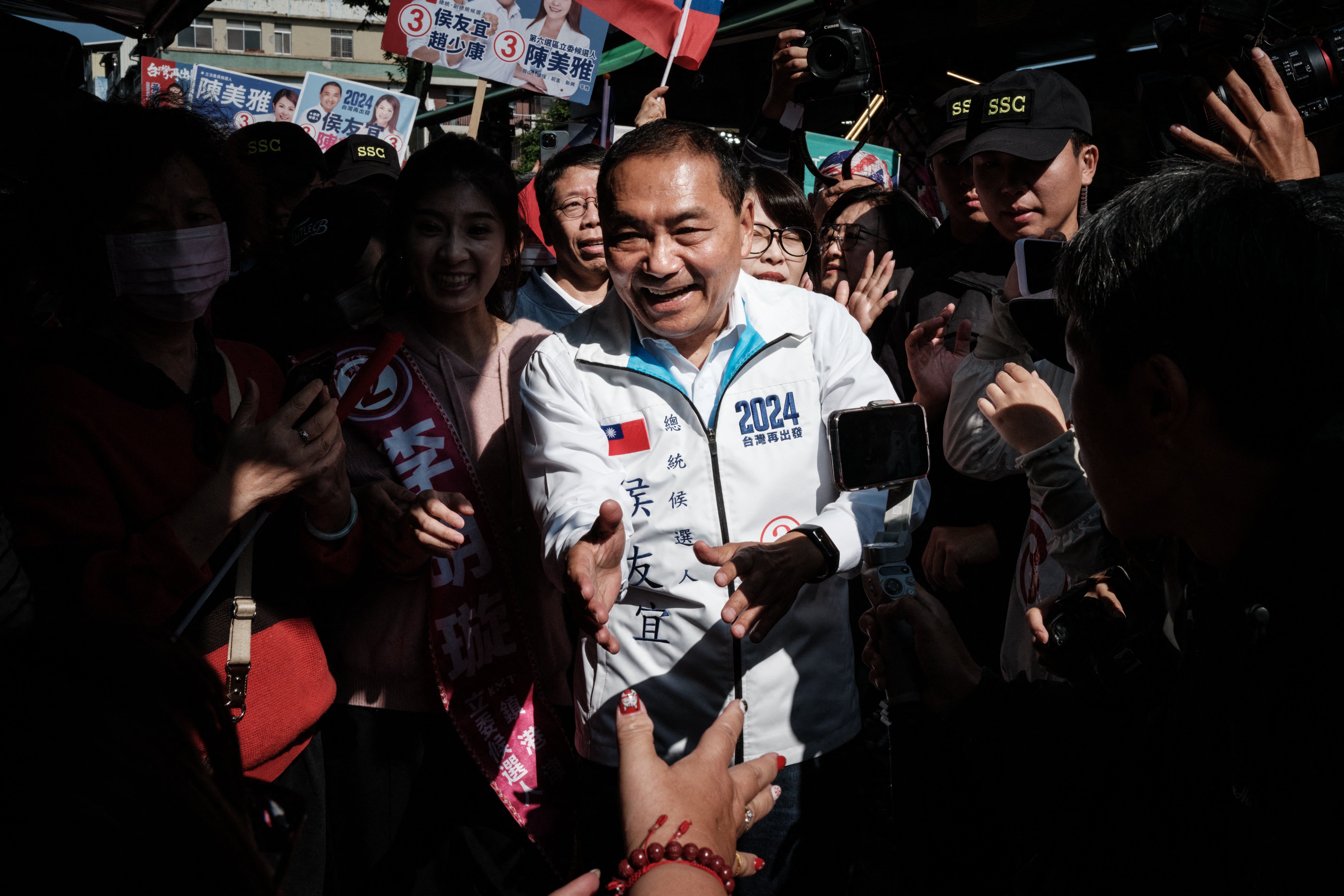Opposition presidential candidate Hou Yu-ih visiting a market during a campaign visit in Kaohsiung, Taiwan, on Wednesday