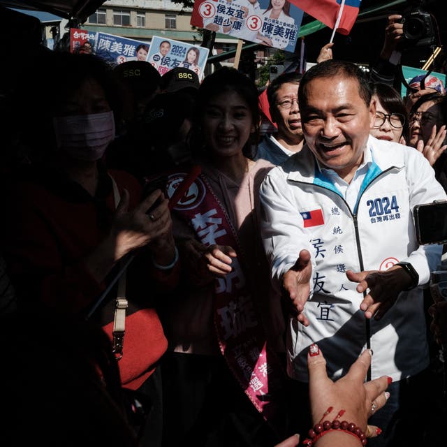 <p>Opposition presidential candidate Hou Yu-ih visiting a market during a campaign visit in Kaohsiung, Taiwan, on Wednesday</p>