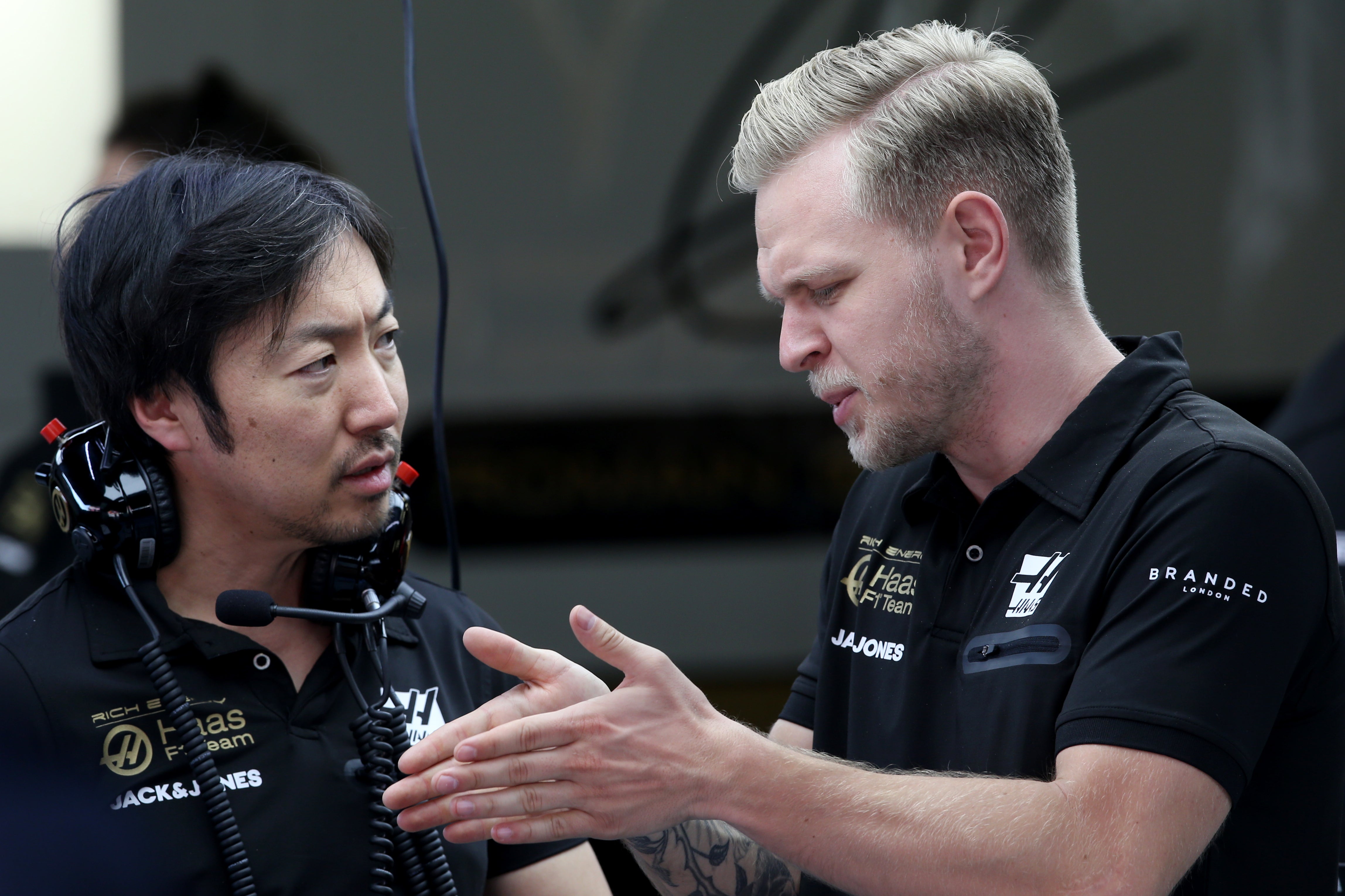 New team principal Ayao Komatsu with Haas driver Kevin Magnussen