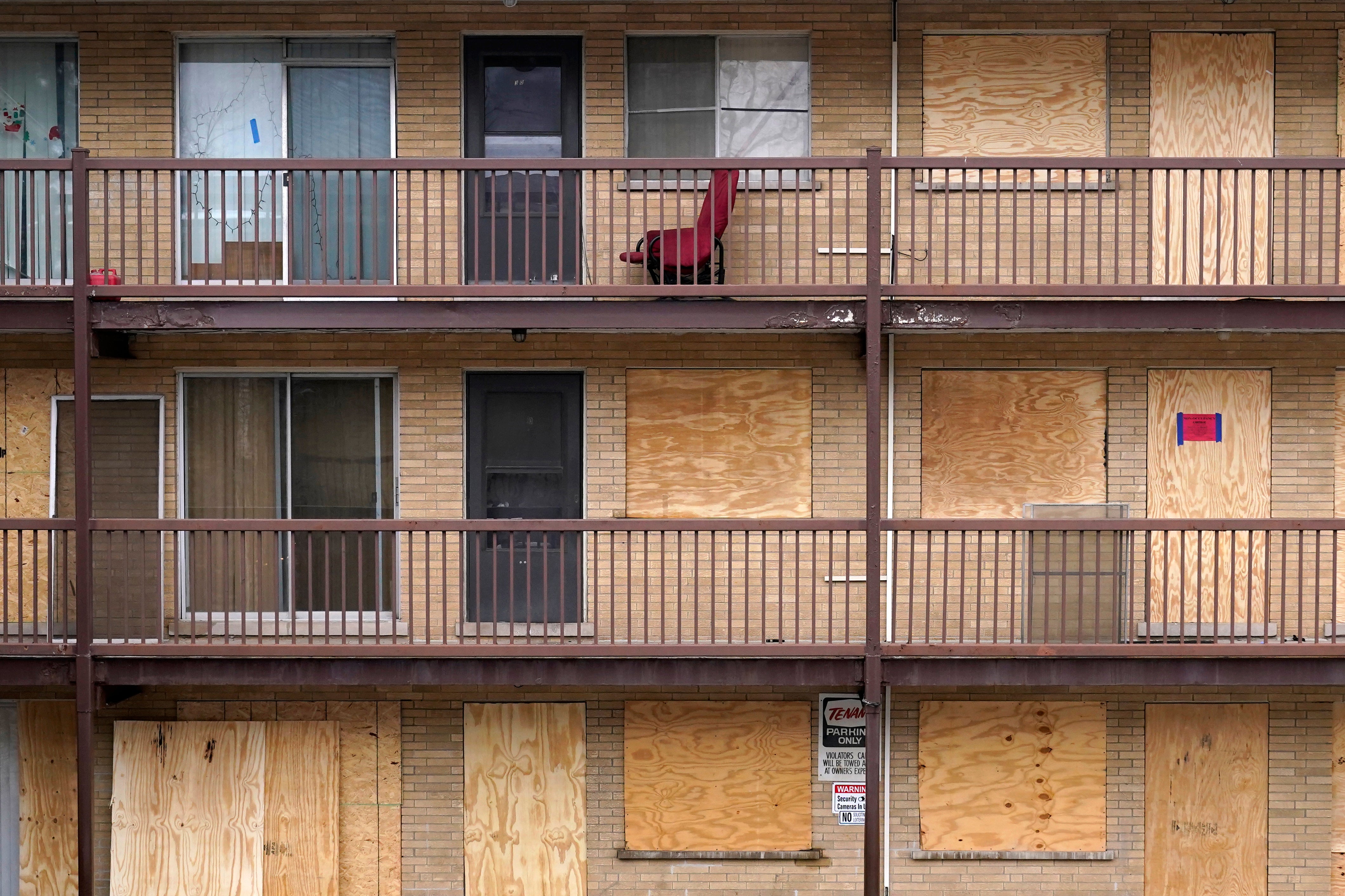 Apartments boarded up while tenants were still inside in Harvey, Illinois
