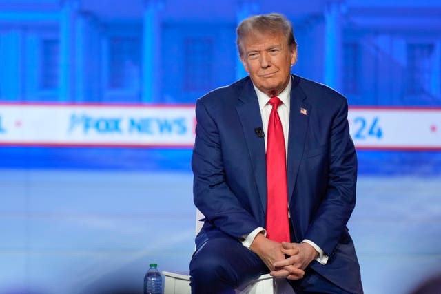 <p>Republican presidential candidate former President Donald Trump listens during a Fox News Channel town hall in Des Moines, Iowa, Wednesday, Jan. 10, 2024</p>