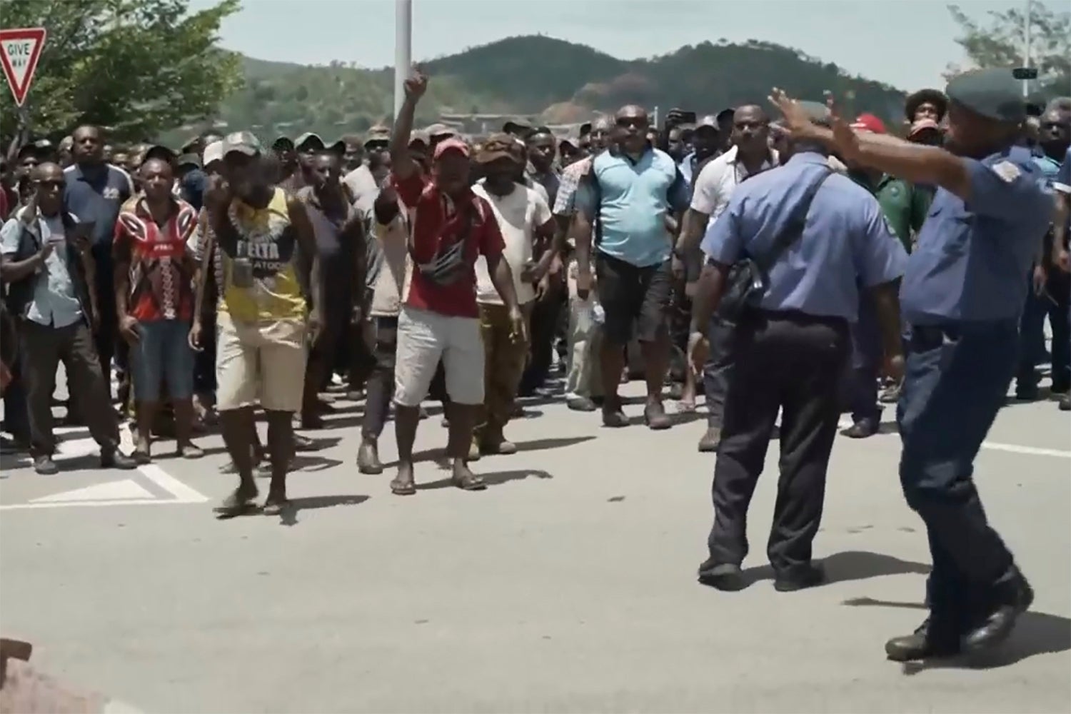 This image made from video shows a protest in Port Moresby, Papua New Guinea
