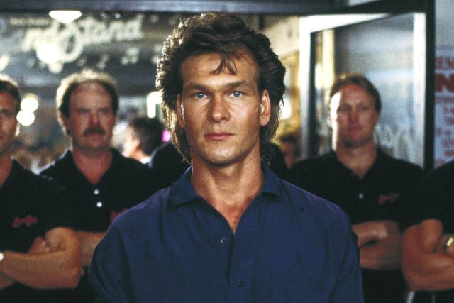 <p>Patrick Swayze in the raucous 1989 action thriller ‘Road House’ </p>