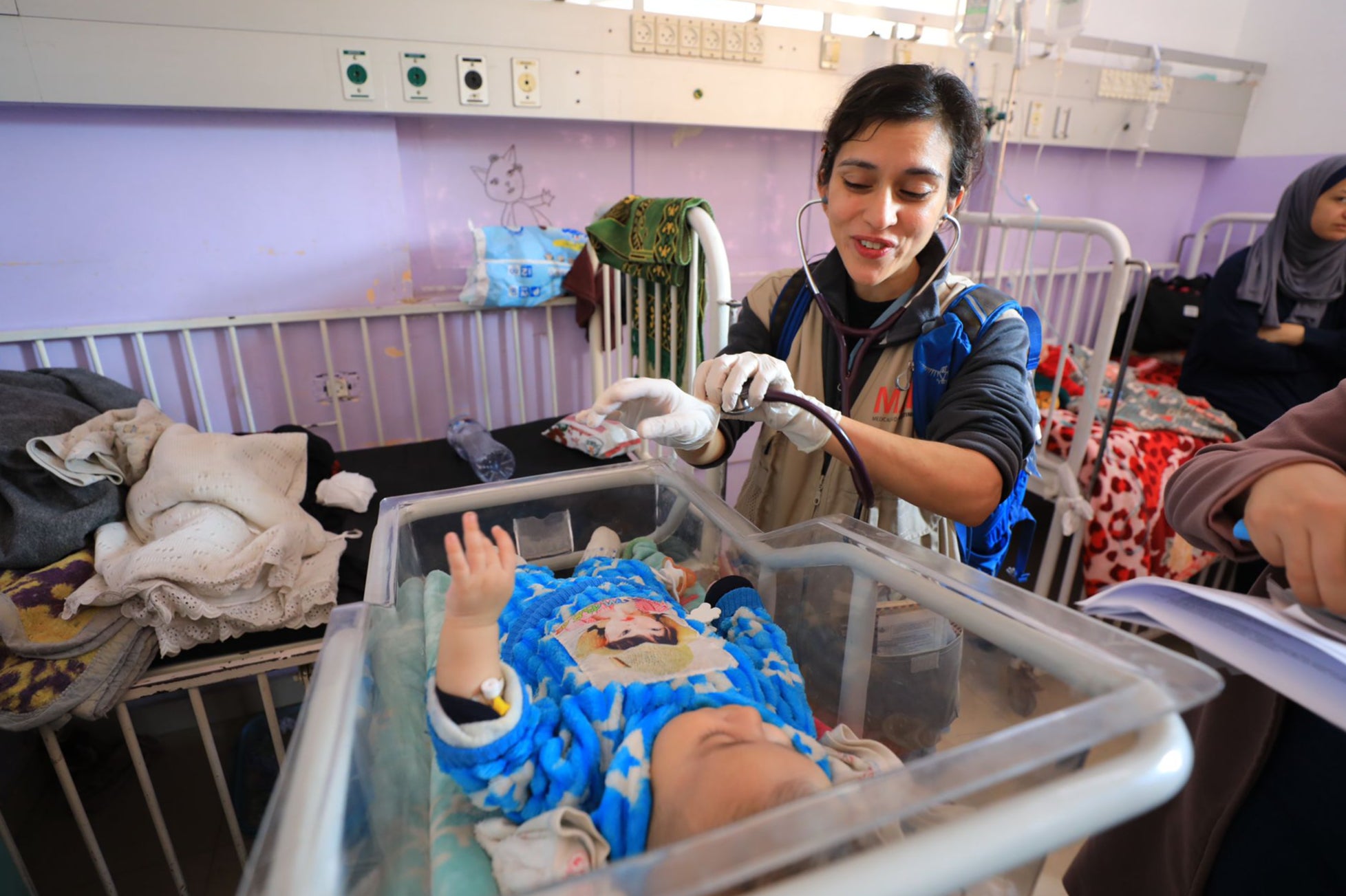 Seema Jilani, a paediatrician, treats children at al-Aqsa Hospital in Gaza