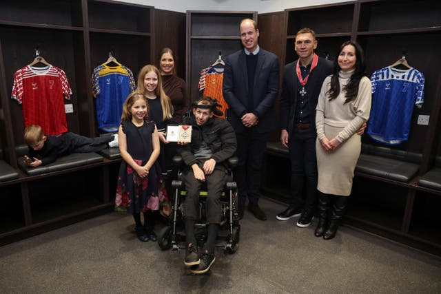 <p>The Prince of Wales meets Rob Burrow, Kevin Sinfield and their families on a visit to Leeds </p>