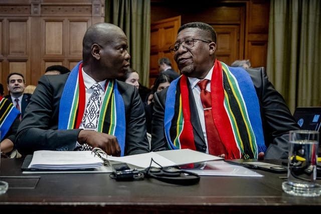 <p>South Africa’s minister of justice Ronald Lamola (left) and ambassador to the Netherlands Vusimuzi Madonsela attend the International Court of Justice at The Hague </p>