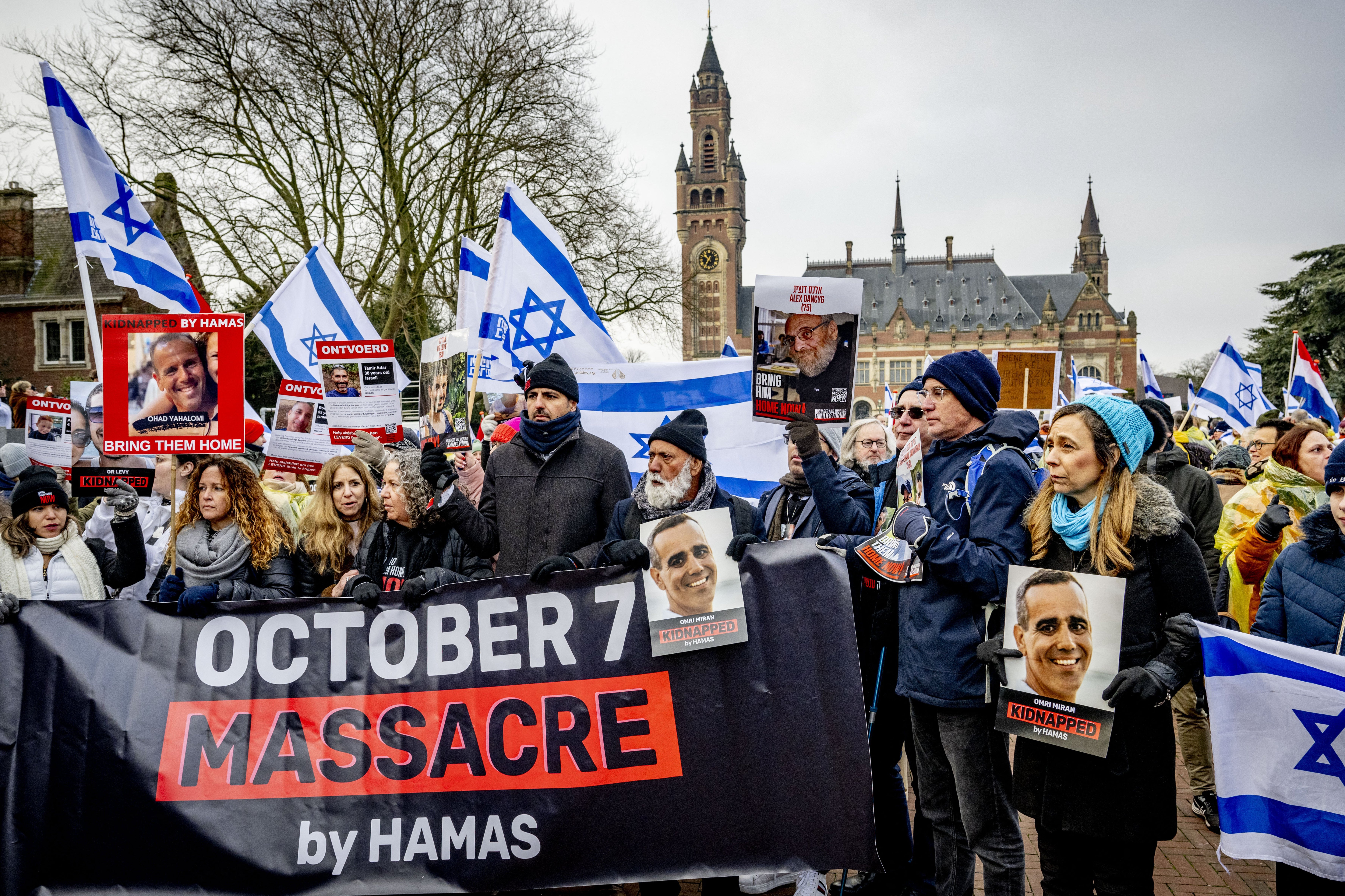 Pro-Israel demonstrators take part in a protest outside the court building at The Hague on 11 January