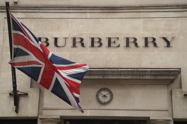 The Burberry store on New Bond Street, London. The fashion firm downgraded its profit guidance due to sharp slowdown in luxury demand (Yui Mok/PA)