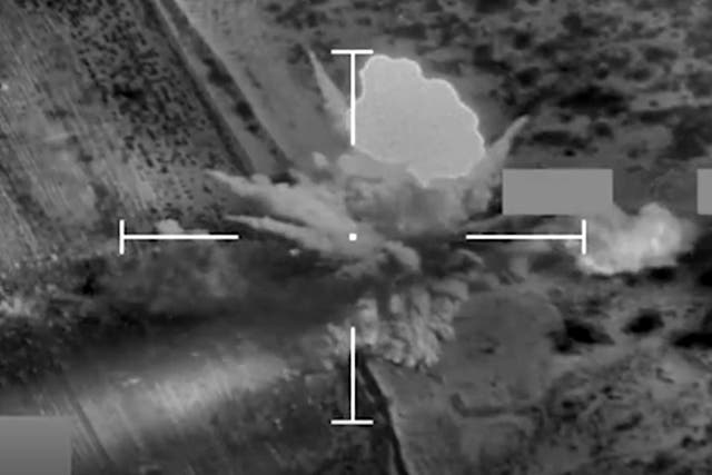 <p>Aerial footage showing the moment an RAF Typhoon strikes a military target in Yemen </p>