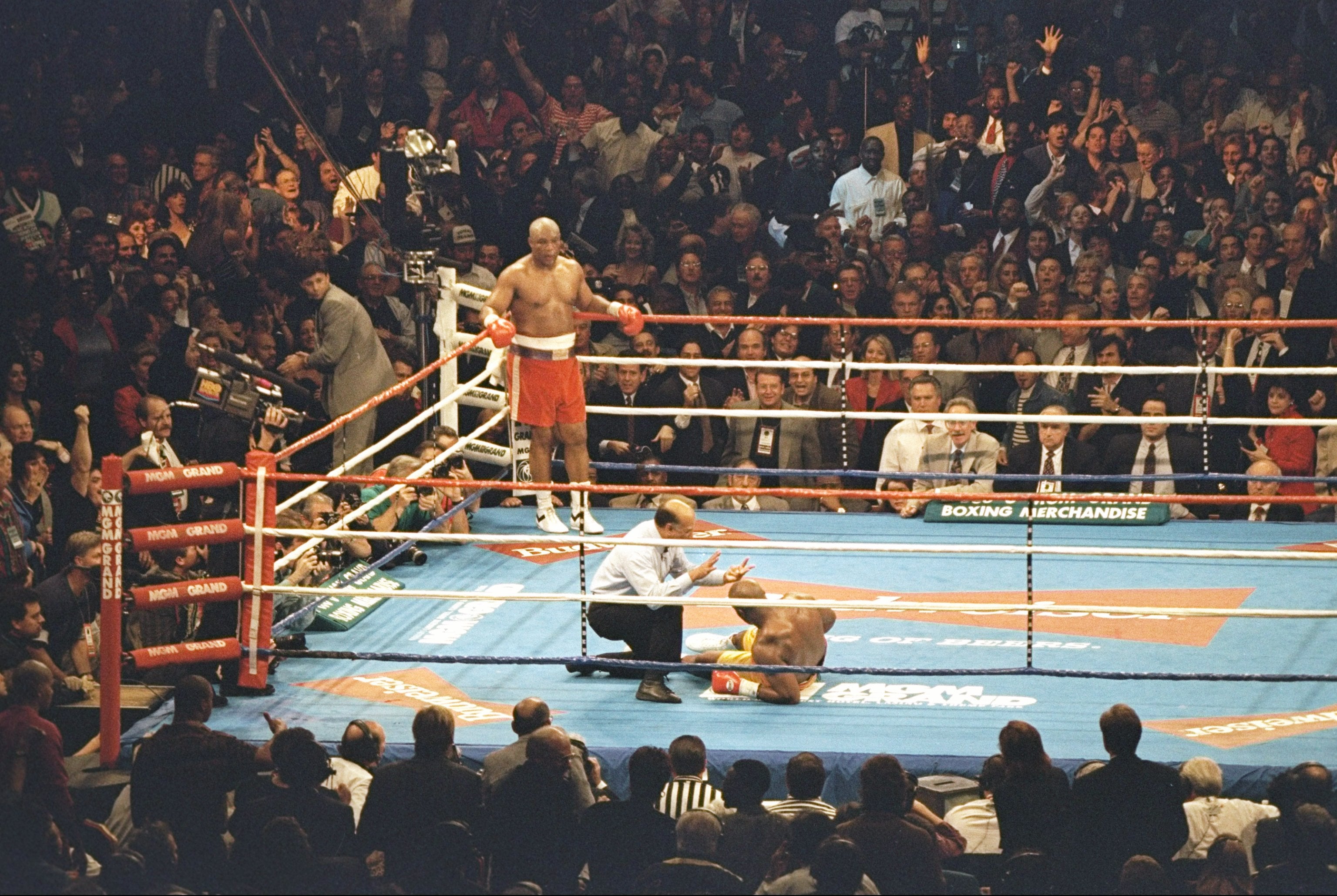 Foreman after knocking down Michael Moorer in their fight in 1994