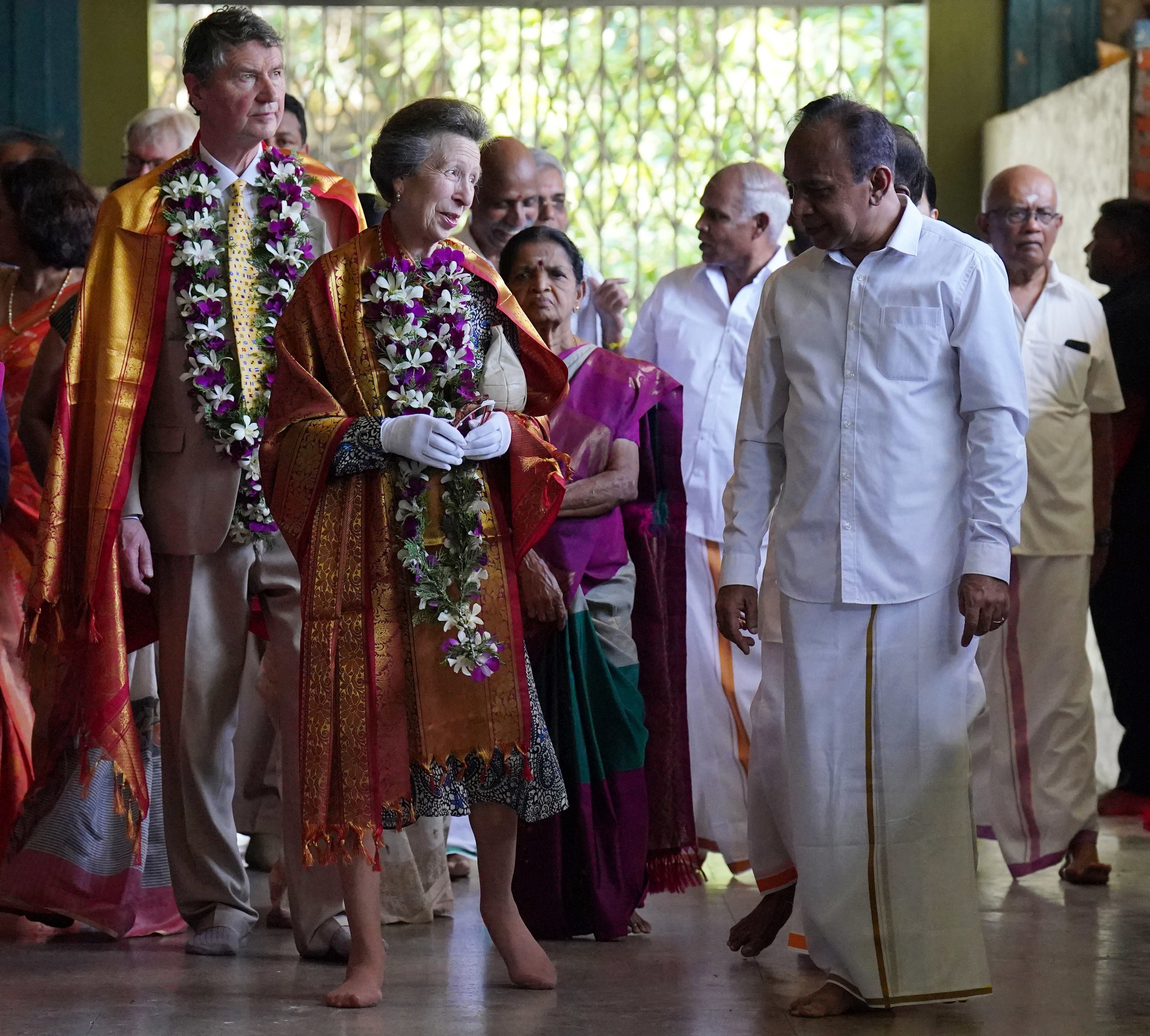 The Princess Royal and her husband Vice Admiral Sir Timothy Laurence during a visit to Vajira Pillayar Kovil Hindu temple in Colombo, Sri Lanka