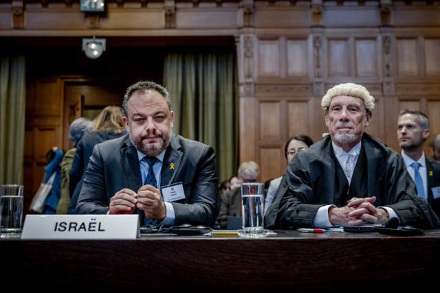 <p>Tal Becker, left, legal counselor of Israel’s Foreign Ministry, and lawyer Malcolm Shaw at the International Court of Justice (ICJ) prior to the hearing of the genocide case against Israel</p>