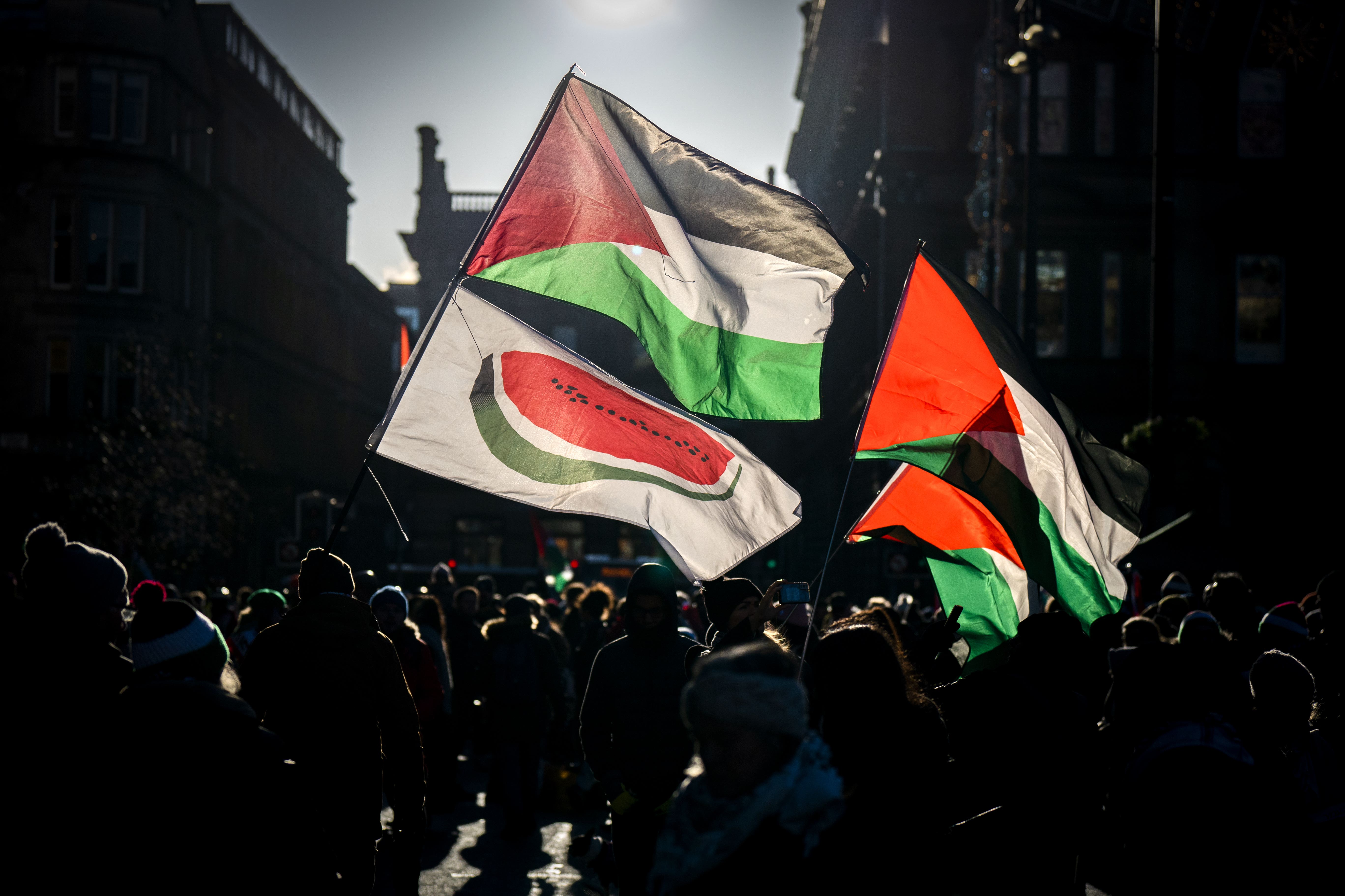 A 24-year-old man has been charged with wearing a green headband with writing on it which is said to arouse ‘reasonable suspicion’ he supports Hamas (Jane Barlow/PA)