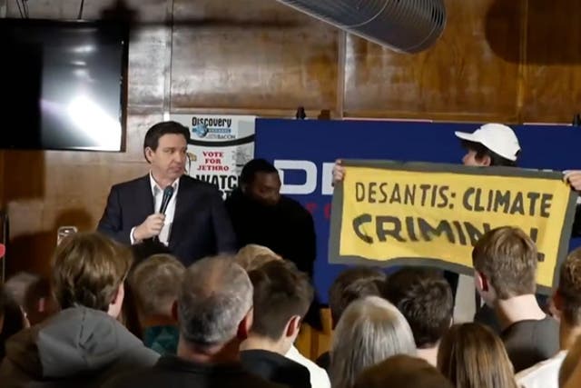 <p>Security guard tackles protester at DeSantis event in Iowa.</p>