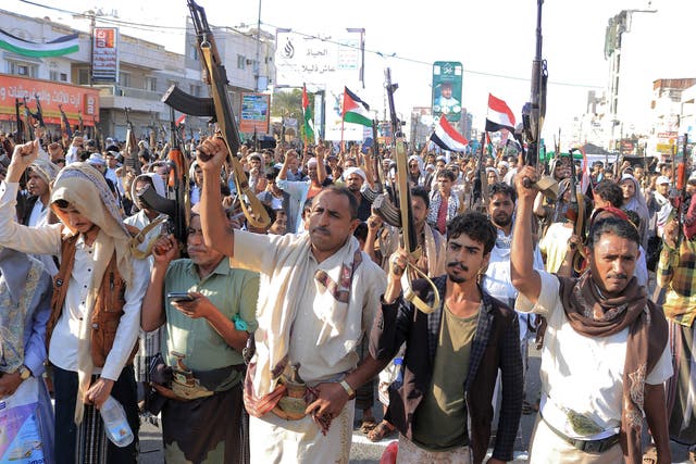 <p>People take part in a protest on the streets of the Yemeni Red Sea city of Hodeidah</p>