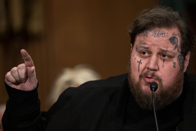 <p>Jason ‘Jelly Roll’ DeFord testifies before the Senate Banking, Housing, and Urban Affairs committee on 11 January 2024</p>