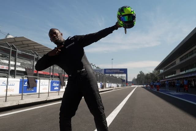 <p>Usain Bolt takes record-breaking Formula E car for a spin</p>