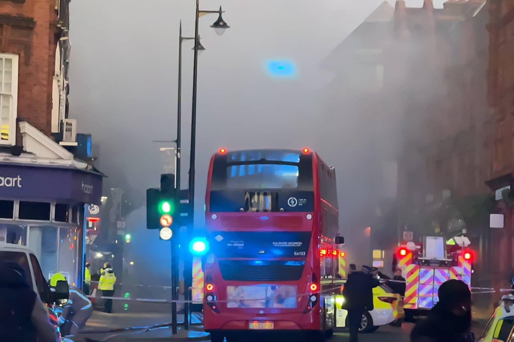 <p>Three fire engines and around 15 firefighters attended the scene of the rush hour bus fire in Wimbledon on Thursday (@StevenW65432097/PA)</p>