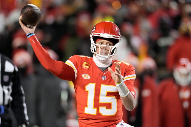 <p>Kansas City Chiefs quarterback Patrick Mahomes (15) passes for a touchdown during the first half of an NFL wild-card playoff football game against the Miami Dolphins (Charlie Riedel/AP)</p>