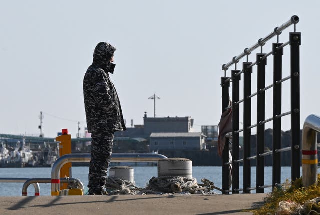 <p>A man stands on a pier at Yeonpyeong island, near the ‘northern limit line’ sea boundary with North Korea, on 6 January 2024, a day after North Korea’s shelling</p>