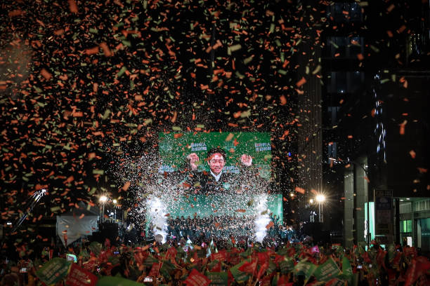 Confetti flies over the stage and crowd as Taiwan’s Vice President and presidential-elect from the Democratic Progressive Party Lai Ching-te