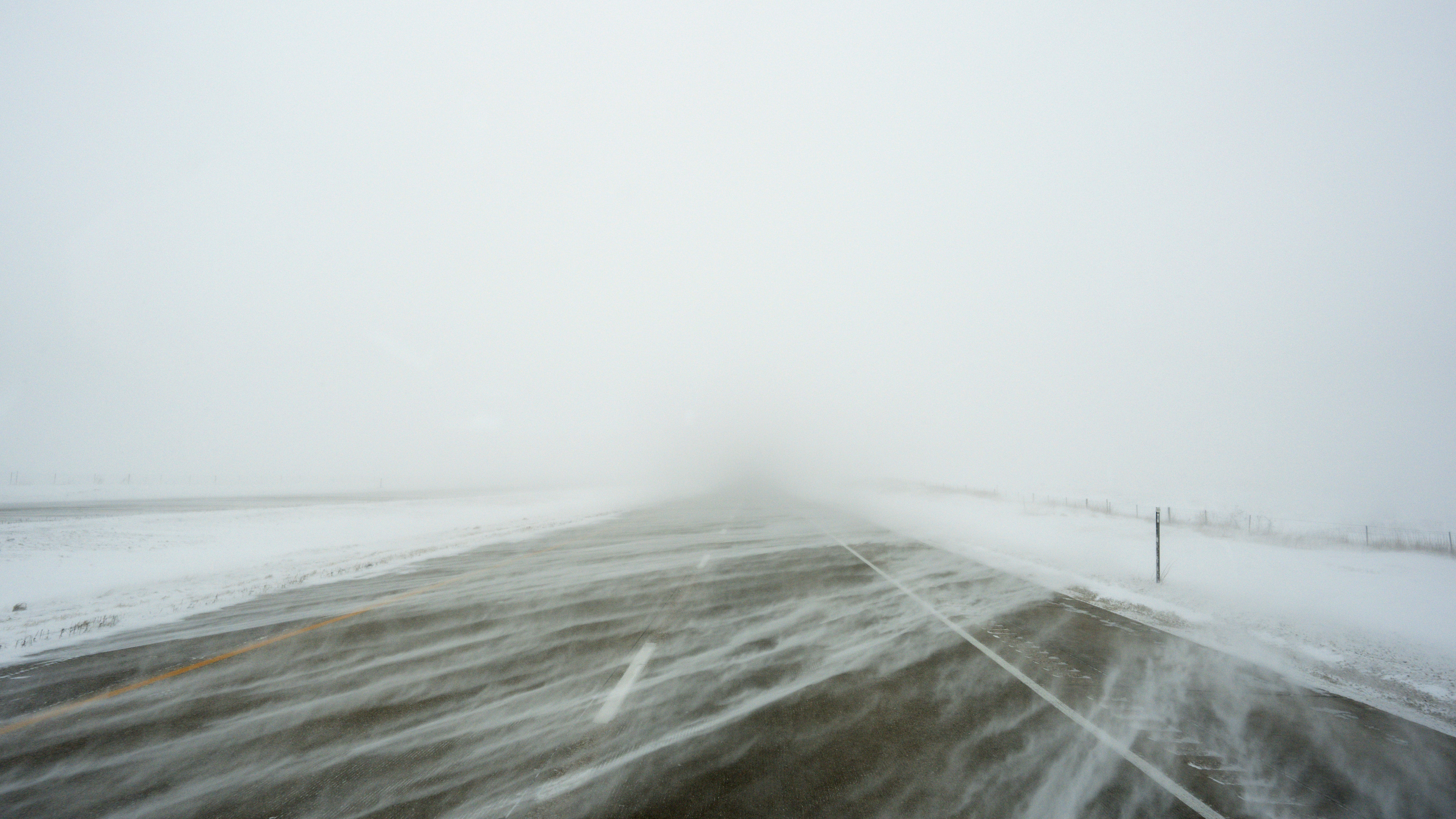 A snowy US Highway 20 is seen during a blizzard near Galva, Iowa, Saturday, Jan. 13, 2024